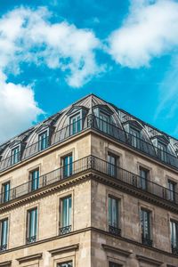 Building in paris with blue sky in background