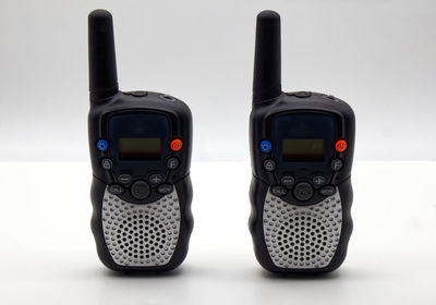 Close-up of camera against white background