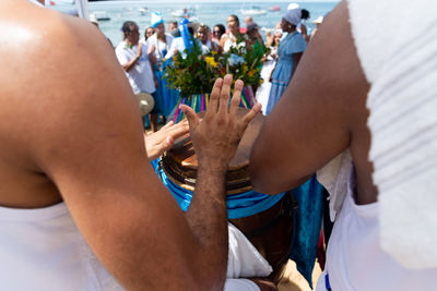 Percussionist hands playing atabaque.