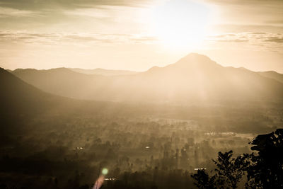 Scenic view of mountains against sky during sunset