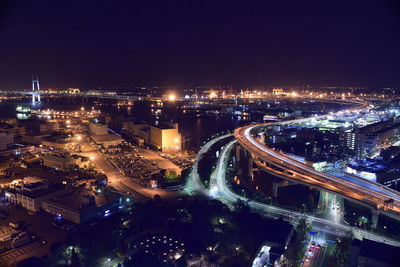 Illuminated cityscape at night