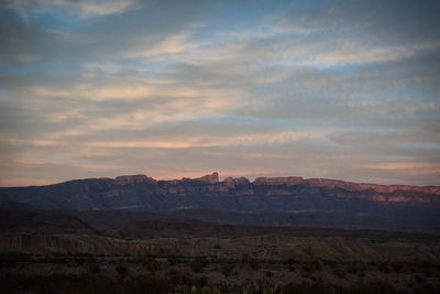 Scenic view of landscape against sky during sunset