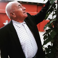 Portrait of smiling man looking away