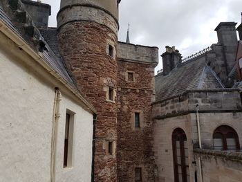 Low angle view of old building against sky