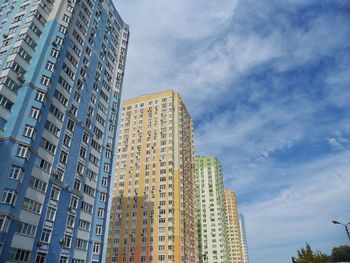 Low angle view of skyscrapers against sky