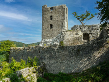 Low angle view of historic building against sky