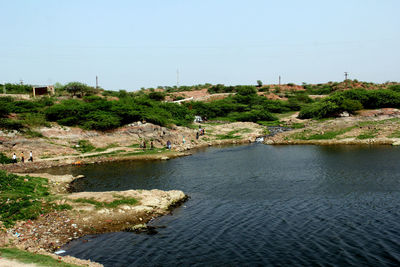 Scenic view of river against clear sky