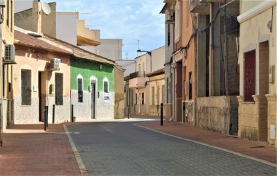 Street amidst buildings in city