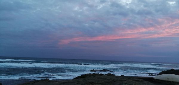 Scenic view of sea against sky during sunset