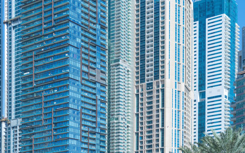 Low angle view of modern buildings in city