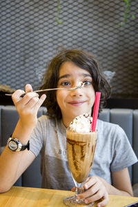 Girl having dessert at cafe