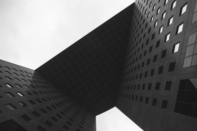 Low angle view of modern building against sky