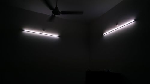 Low angle view of illuminated ceiling