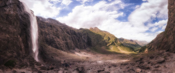 Panoramic view of mountain range against sky