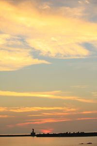 Scenic view of silhouette landscape against sky during sunset