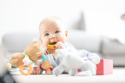 Portrait of cute girl with teddy bear