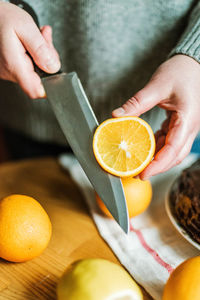 Midsection of man preparing food