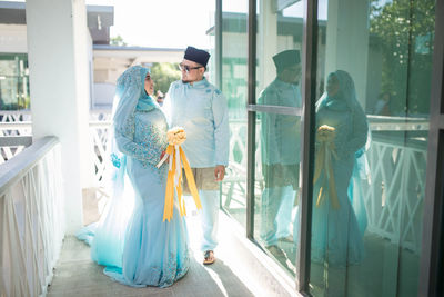 Young couple standing outdoors