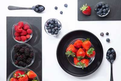 High angle view of strawberries on table