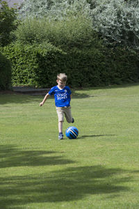 High angle view of boy playing in park