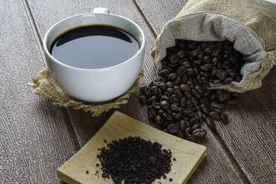 High angle view of coffee cup on table