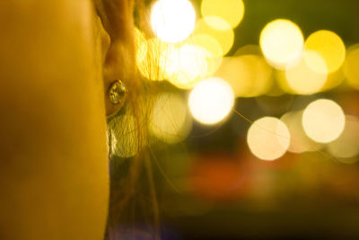 Defocused image of illuminated lights at night