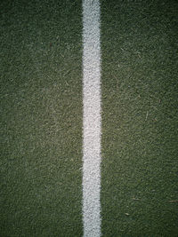 High angle view of umbrella on field