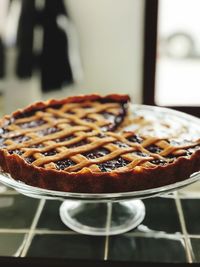 Close-up of cherry pie in plate on table