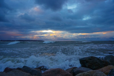 Scenic view of sea against sky during sunset