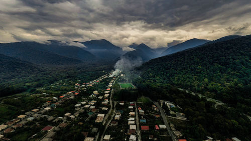 Georgian village against the backdrop of mountains