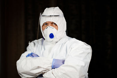 Portrait of man wearing hazmat suit