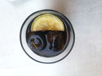 Directly above shot of cold drink in glass on table