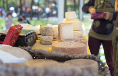 Various cheese for sale at market
