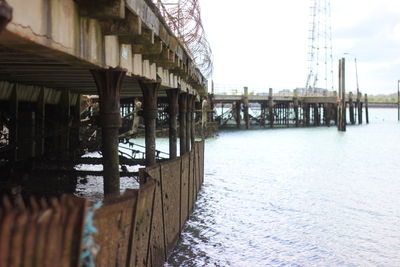 Pier over sea against sky