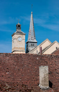 Low angle view of old building against sky