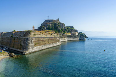 View of castle by sea