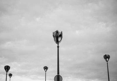 Low angle view of street light against sky