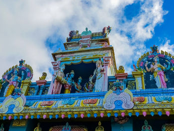 Low angle view of statue against sky