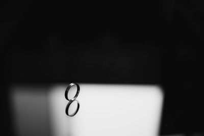 Close-up of lamp against black background