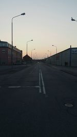 Empty road at sunset