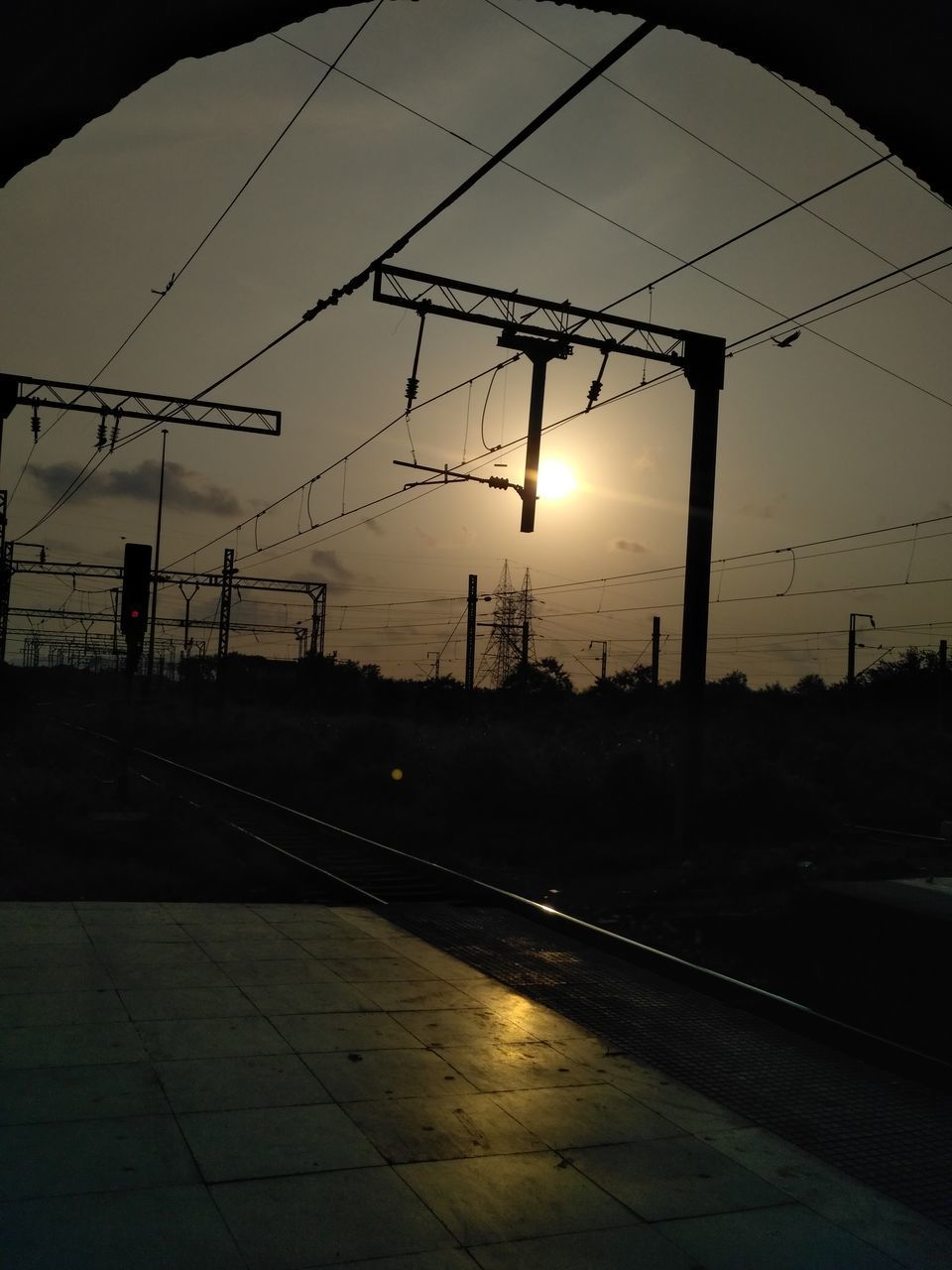 RAILROAD TRACK AT SUNSET