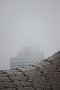 Buildings against sky during winter