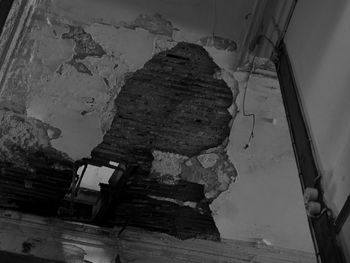 Low angle view of steps in abandoned building
