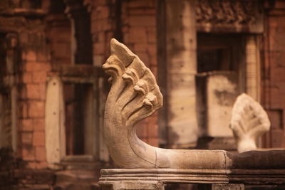 Cropped image of statue in temple