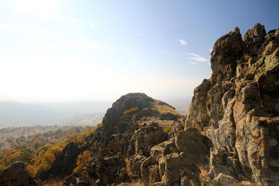 Scenic view of rocky mountains against sky