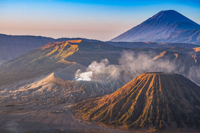 Bromo, batok and semeru volcanoes at sunrise, java island, indonesia
