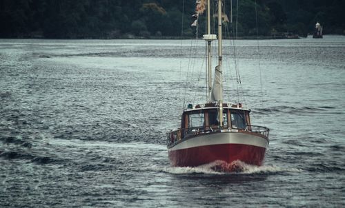 Boat in sea against sky