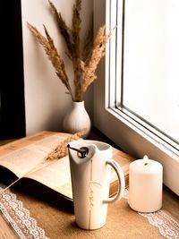 Close-up of coffee cup on table