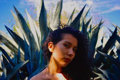 Portrait of young woman looking away