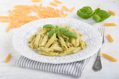 High angle view of pasta in plate on table